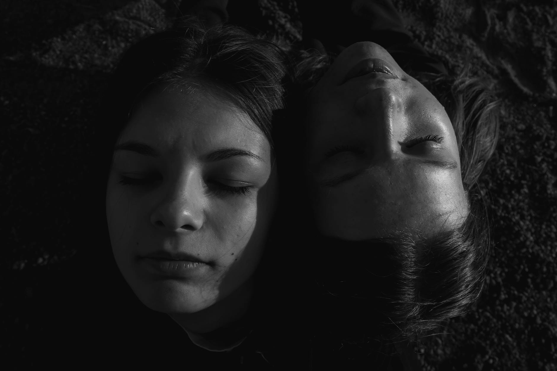 a close up shot of women with their eyes closed