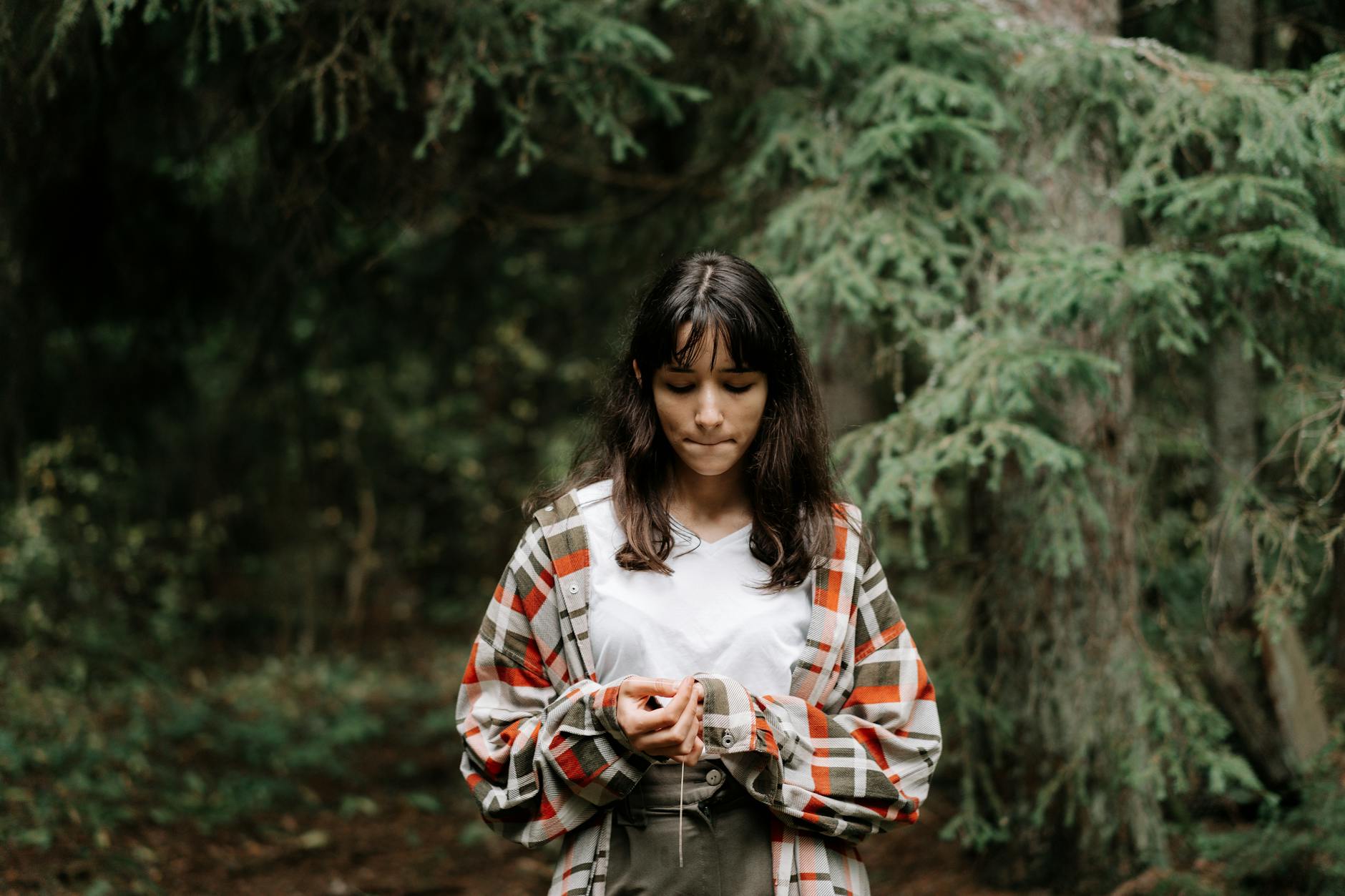 teen in a plaid jacket